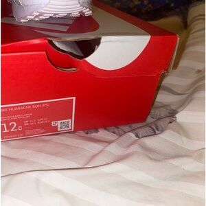 Brand new white 12c Nike Hurraches. Never worn. Perfect condition.